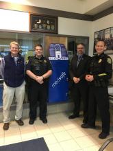 Pictured here: Cole Carson, Sunrisers President, Officer Doug Welborn, Mayor Jim Matherly, and Chief Eric Jewkes with Medsafe